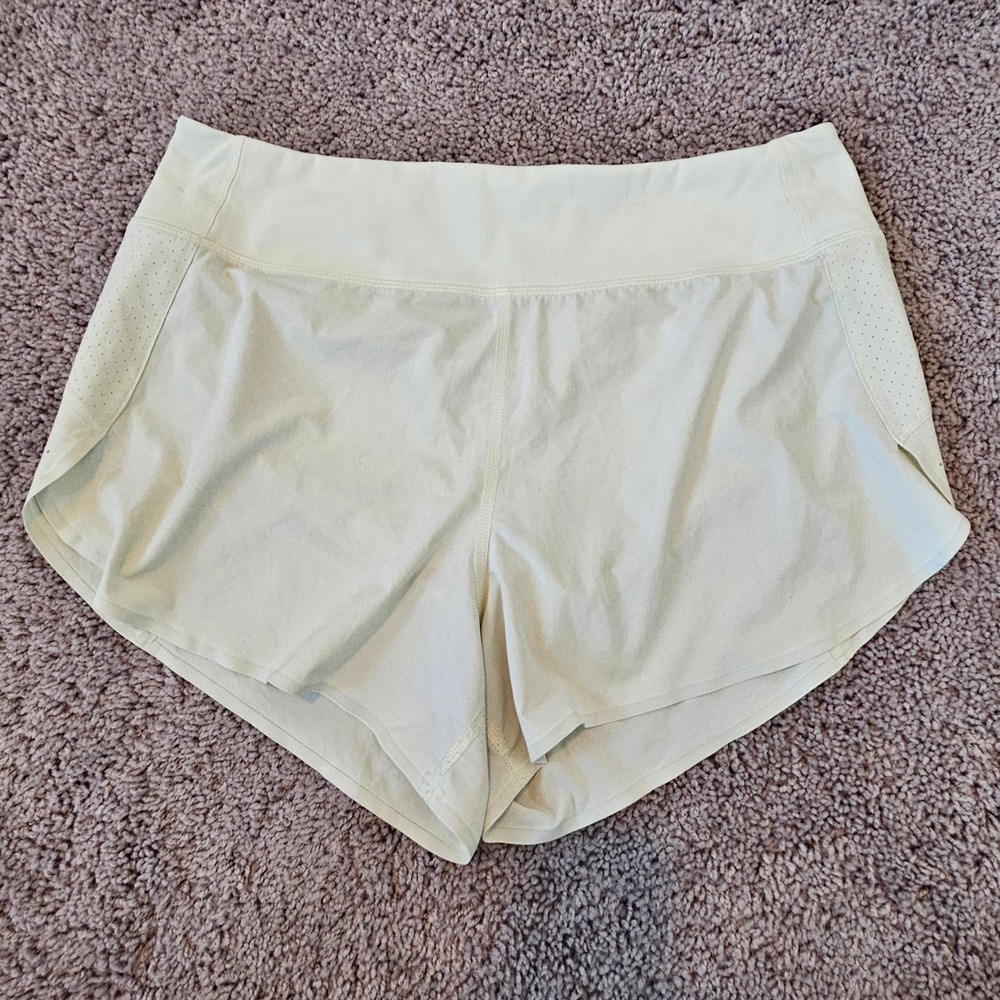 Athleta Run With It Shorts Size M Yellow Perforated 3.5" Lightweight Training